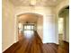 Spacious living room featuring hardwood floors and an open floor plan at 15782 Sw 16Th Avenue Rd, Ocala, FL 34473