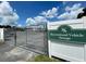 Recreational Vehicle Storage area surrounded by chain link fence and partly cloudy skies at 15782 Sw 16Th Avenue Rd, Ocala, FL 34473