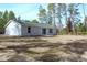 The home has a cozy back patio and the large, flat yard is perfect for pets, play, or relaxing at 20 Malauka Pass Crse, Ocklawaha, FL 32179