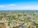 Peaceful community featuring single-Gathering homes nestled amongst mature trees and green spaces at 2087 Bonneau Ln, The Villages, FL 32162