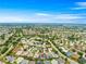 Lovely community with homes nestled amongst mature trees and lush green landscapes at 2087 Bonneau Ln, The Villages, FL 32162