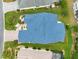 Overhead view of a home featuring a well-maintained blue roof and manicured landscaping at 2087 Bonneau Ln, The Villages, FL 32162