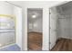 Bathroom featuring a glass-enclosed shower, plus bedroom and closet entrances at 2087 Bonneau Ln, The Villages, FL 32162