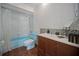Renovated bathroom featuring vanity and bathtub at 21168 Sw Peach Blossom St, Dunnellon, FL 34431