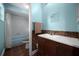 Inviting bathroom featuring vanity and bath tub at 21168 Sw Peach Blossom St, Dunnellon, FL 34431