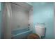 Clean bathroom featuring bath tub and toilet at 21168 Sw Peach Blossom St, Dunnellon, FL 34431