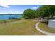 Community park near the lake with a playground and a wooden dock for easy lake access at 21168 Sw Peach Blossom St, Dunnellon, FL 34431