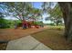 A colorful playground provides a fun and safe recreational area for children to enjoy outdoor activities at 21168 Sw Peach Blossom St, Dunnellon, FL 34431