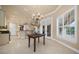 Bright breakfast nook with white shutters and views of the backyard at 2146 Se 25Th Loop, Ocala, FL 34471