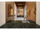 Butler's pantry with granite countertop, mirrored backsplash, and wine chiller at 2146 Se 25Th Loop, Ocala, FL 34471