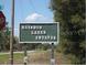 Rainbow Lakes Estates community sign, a desirable and established neighborhood at 21570 Sw Raintree St, Dunnellon, FL 34431