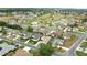 Beautiful aerial view of a single-Gathering home in a well-maintained neighborhood at 2323 Nw 55Th Avenue Rd, Ocala, FL 34482