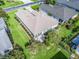 Overhead aerial view of the home showcasing the backyard, landscaping, and roof at 2323 Nw 55Th Avenue Rd, Ocala, FL 34482