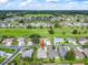 Aerial view showcasing the home's location in the community near the golf course at 2323 Nw 55Th Avenue Rd, Ocala, FL 34482