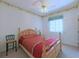 Bedroom with natural wood furniture and soft tones create a peaceful retreat at 2323 Nw 55Th Avenue Rd, Ocala, FL 34482