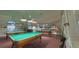 This community game room features four billiards tables for enjoyment at 2323 Nw 55Th Avenue Rd, Ocala, FL 34482