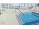 Relax in the community hot tub with views of the sparkling pool and comfortable seating on the surrounding deck at 2323 Nw 55Th Avenue Rd, Ocala, FL 34482