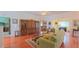 Bright living room with hardwood floors, inviting furniture, and an open layout for gatherings at 2323 Nw 55Th Avenue Rd, Ocala, FL 34482