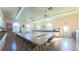 Bright community meeting room features ceiling fans and tables for activities at 2323 Nw 55Th Avenue Rd, Ocala, FL 34482