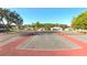 Picture displays well-maintained tennis courts with lush landscaping in a serene community setting at 2323 Nw 55Th Avenue Rd, Ocala, FL 34482