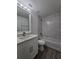Bathroom featuring updated shower and tub with decorative tile and modern vanity at 263 Oak Lane Trak, Ocala, FL 34472