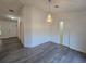 The dining room features hard surface floors and a decorative chandelier at 263 Oak Lane Trak, Ocala, FL 34472