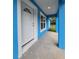 Front entrance showcasing a white front door and ample natural light through adjacent windows at 263 Oak Lane Trak, Ocala, FL 34472