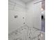Laundry room with modern marble tile flooring and storage shelf at 263 Oak Lane Trak, Ocala, FL 34472