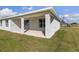 Home's back porch offers an open and airy space for outdoor enjoyment and relaxation at 2647 Sw 178 St, Ocala, FL 34473