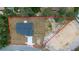 Aerial view of the property, highlighting the lot lines, the house, and surrounding land at 28 Olive Dr, Ocala, FL 34472
