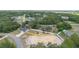 Aerial shot of the house surrounded by trees and other homes in the quiet neighborhood at 28 Olive Dr, Ocala, FL 34472