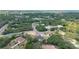 A serene aerial shot of the residential area, showcasing its layout and proximity to green spaces at 28 Olive Dr, Ocala, FL 34472