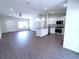 Open floor plan showcasing the living room and kitchen, great for entertaining at 28 Olive Dr, Ocala, FL 34472