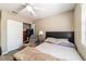 Bedroom features a comfortable chair, closet, and wood-look flooring at 31 Palm Rd, Ocala, FL 34472