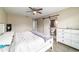 Comfortable bedroom featuring a barn door that leads to the bathroom and light-colored walls at 31 Palm Rd, Ocala, FL 34472