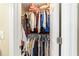 A tidy closet filled with a variety of clothing hung neatly on rods and shelves at 31 Palm Rd, Ocala, FL 34472