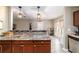 Kitchen with countertop dining and access to the backyard at 31 Palm Rd, Ocala, FL 34472