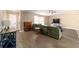 Inviting living area with laminate flooring, neutral walls, and modern ceiling fan at 31 Palm Rd, Ocala, FL 34472