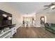 The living room connects to the dining area with lots of natural light at 31 Palm Rd, Ocala, FL 34472