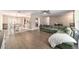 Open-concept living space flows into dining area, perfect for entertaining at 31 Palm Rd, Ocala, FL 34472