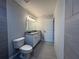 Bathroom features an updated vanity and modern finishes at 4162 Sw Gardenia Ct, Dunnellon, FL 34431