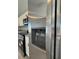 Stainless steel refrigerator featuring a water and ice dispenser complements the kitchen appliances at 4162 Sw Gardenia Ct, Dunnellon, FL 34431