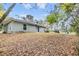 Spacious backyard featuring a grassy lawn perfect for outdoor activities and relaxation at 42 Dogwood Drive Crse, Ocala, FL 34472