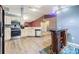 Open floor concept kitchen features new appliances, countertop, flooring and lighting at 42 Dogwood Drive Crse, Ocala, FL 34472