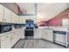 Bright kitchen with stainless steel appliances, ample counter space and new countertops at 42 Dogwood Drive Crse, Ocala, FL 34472