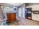 Kitchen with stainless steel appliances, black refrigerator, white cabinets, and new hardware at 42 Dogwood Drive Crse, Ocala, FL 34472