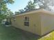 The backyard features an outdoor seating area and green space at 5092 Sw 197Th Ter, Dunnellon, FL 34431