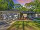 Charming front exterior with attached garage and well-manicured lawn at 5092 Sw 197Th Ter, Dunnellon, FL 34431