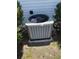 Outdoor AC unit surrounded by greenery, ensuring efficient cooling for the home at 6512 Sw 60Th Ct, Ocala, FL 34474