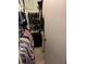 Walk-in closet with hanging racks and shelving to provide ample storage for clothing and accessories at 6512 Sw 60Th Ct, Ocala, FL 34474